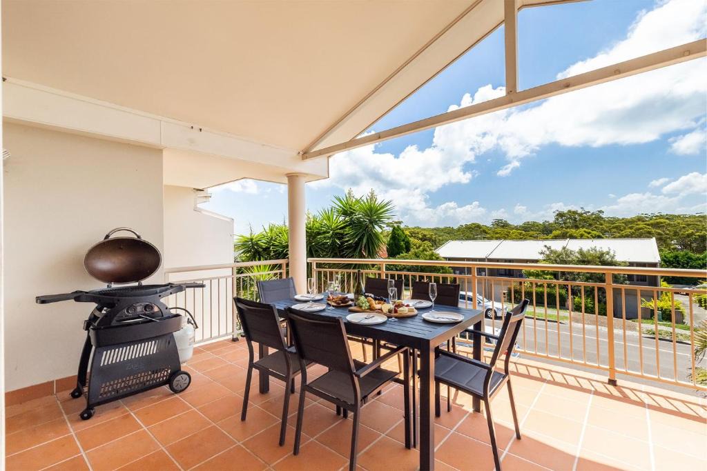 Corlette House | 74A Sergeant Baker Drive comfortable duplex with beautiful distant water views