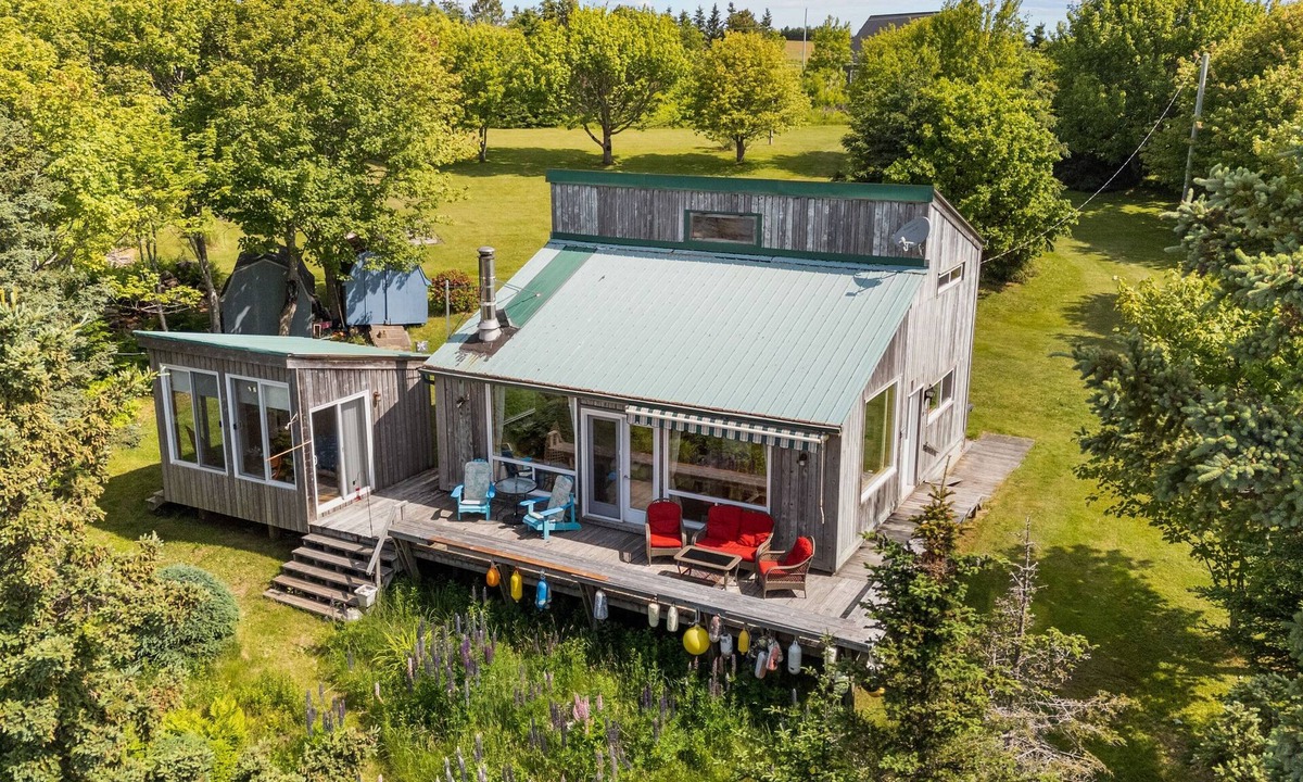 Souris House | Megvy: Oceanfront PEI Beach House with Gazebo, Deck & Private Beach Access