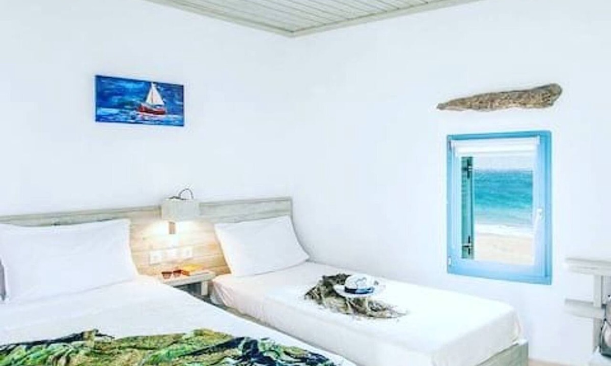 Agios Stefanos House | Meltemi beach house by opus