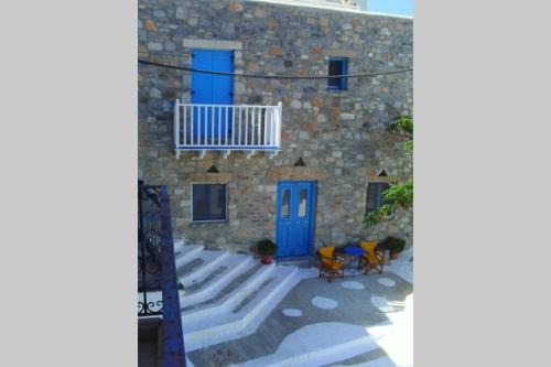 Astypalaia House | Popi Studios Two storey traditional house