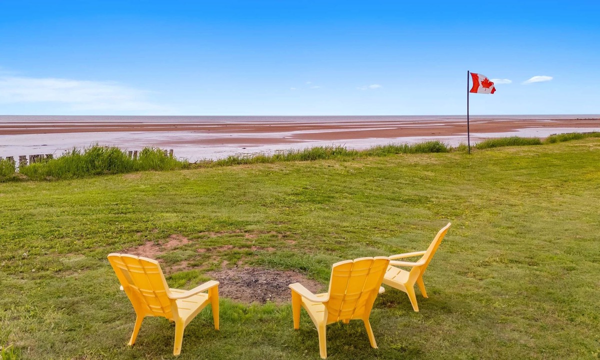 Prince County House | St. Chrysostome South Shore Escape – Private Beach, Hot Tub, Coastal Charm