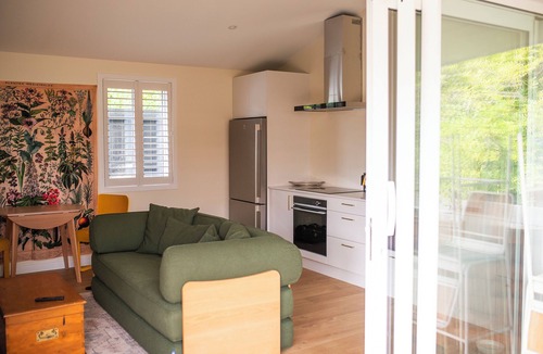 Ponsonby House | City cottage oasis with sunken fire pit and private gated driveway parking.