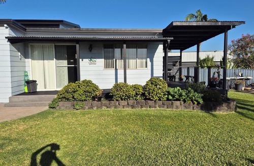Fennell Bay Apartment | Direct water front 3 meters from Lake. Your own private balcony overlooking Lake