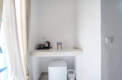 Perissa Apartment | Economy Quadruple Room 5 with Mountain View, Balcony, and Air Conditioning