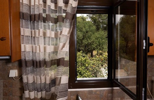 Ormos Agiou Ioannou House | Marin Holiday: Mountain retreat with easy beach access. Cozy home 1.5km from sea