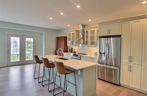 Little Pond Apartment | Spacious upper level 2 bedroom unit overlooking the water