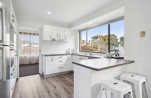 Corindi Beach Apartment | Turtle Lane, steps to the beach, pet-friendly, family beach house.