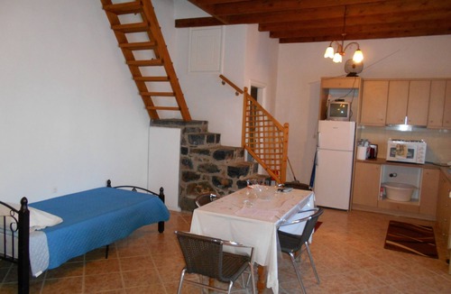 Astypalaia House | Two storey stone built house by the castle