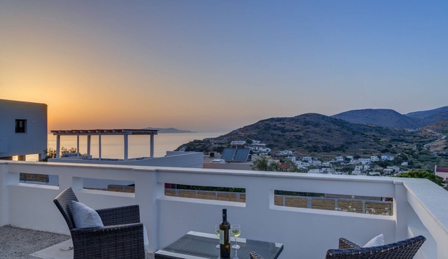 Family house with sunset and sea view.