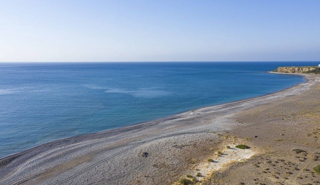Live by the sea at House Myrtos