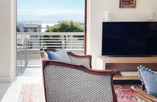 Vouliagmeni Apartment | A unique 3 level penthouse with a great sea view to Vouliagmeni Bay
