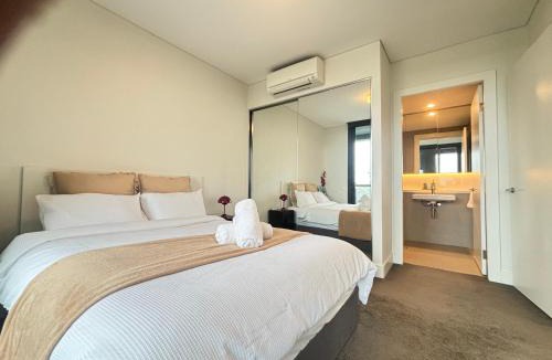 Sydney Olympic Park Apartment | Floor-to-Ceiling Park View Oasis at Olympic Park Free Parking Sleeps 5