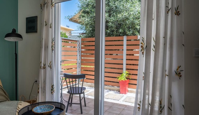 Boho style apartment with spacious front yard in historical district of Chania